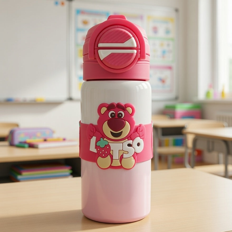 Pink water bottle with cartoon character on a classroom desk