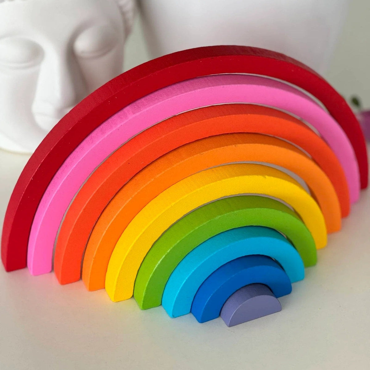 Colorful wooden rainbow building blocks and stacking toy for kids